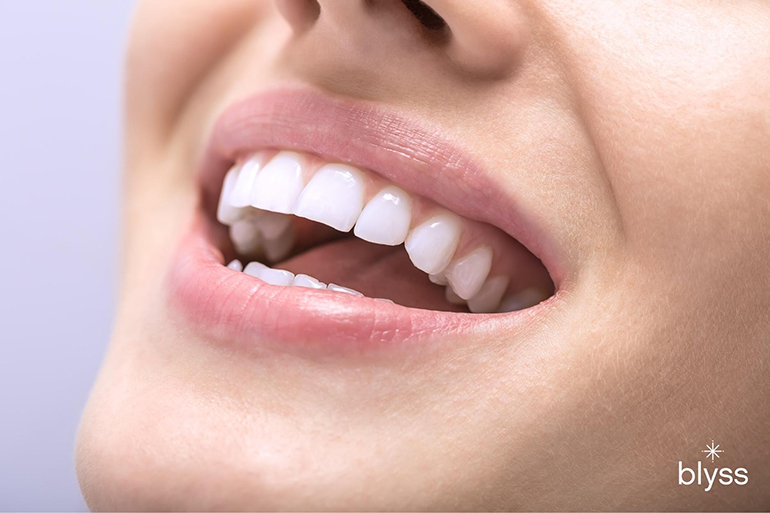 macro photo of perfect white teeth of a woman